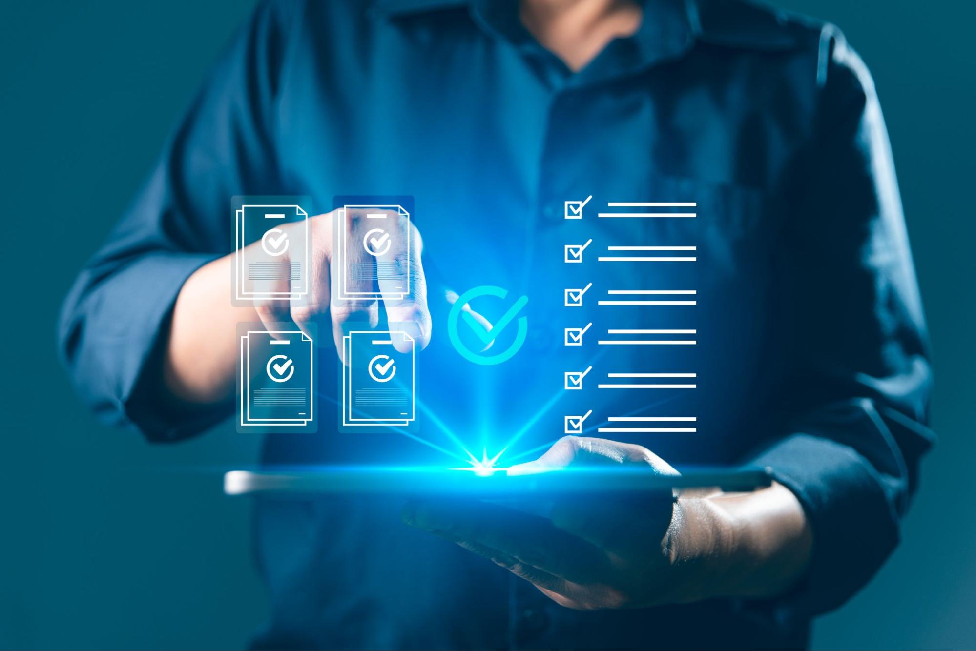 Digital document management, ISO compliance concept business professional approves checklists on virtual interface while holding tablet.