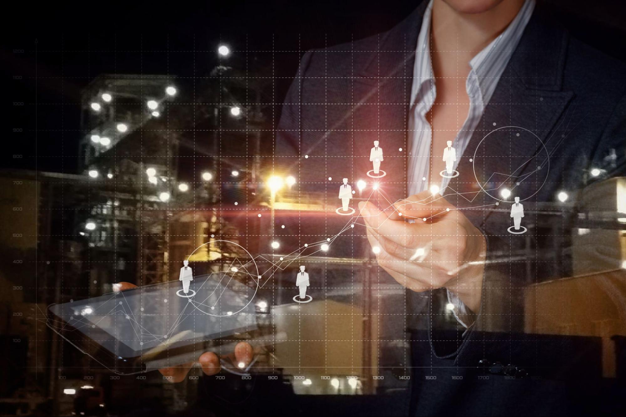 A businesswoman operating with human resources and management graph chart.